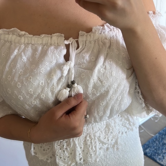 Daisy Chain Ruched Mini Dress
Spell & the gypsy - Picture 12 of 12